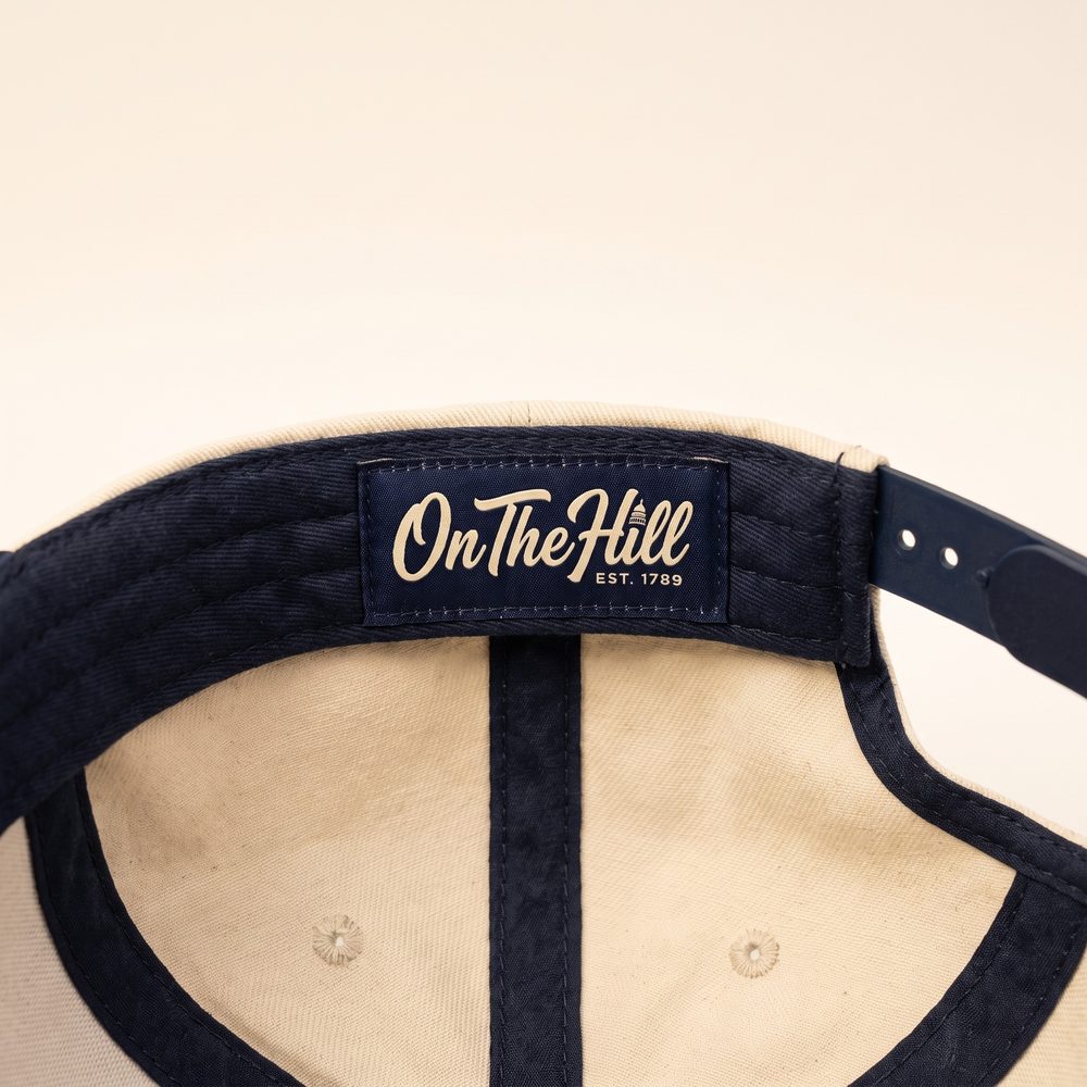 The Swamp cap, Stone crown, navy brim and rope, inside label